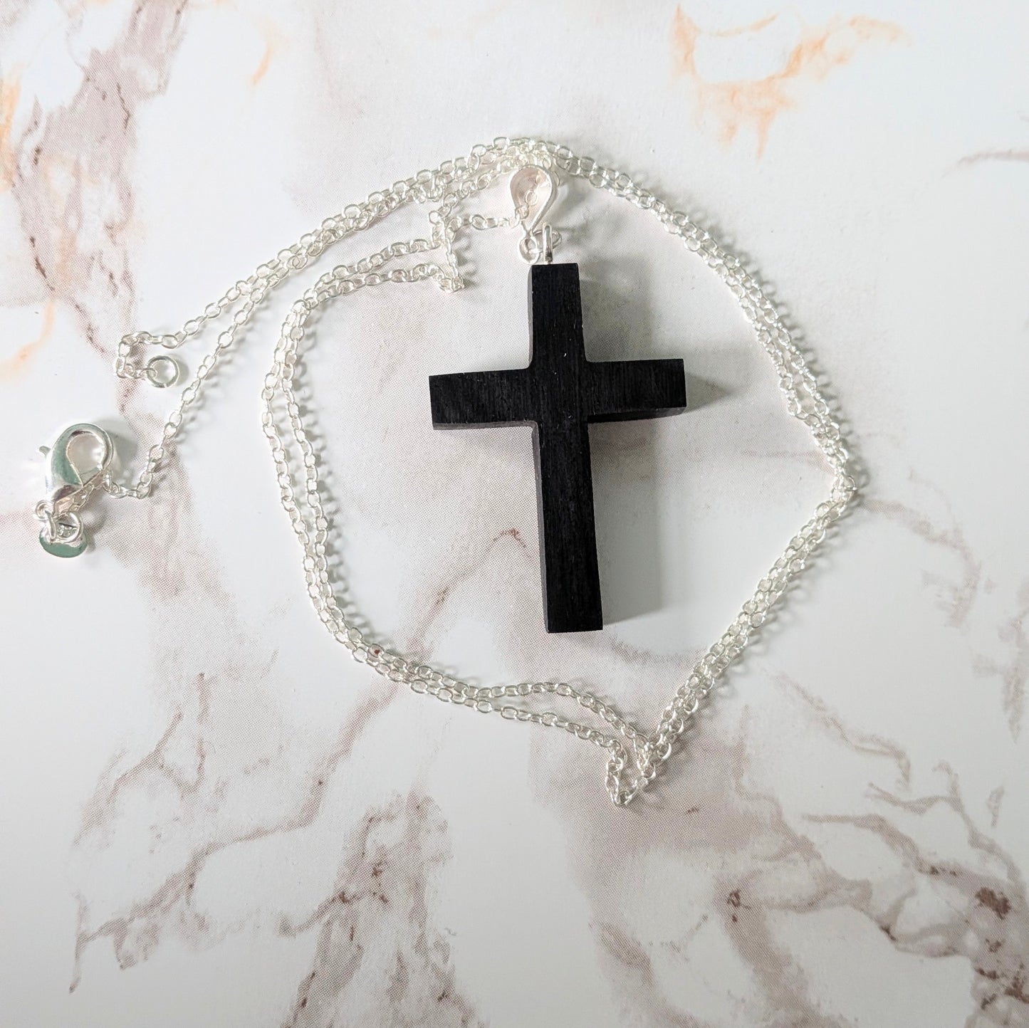 Hand carved African blackwood cross pendant