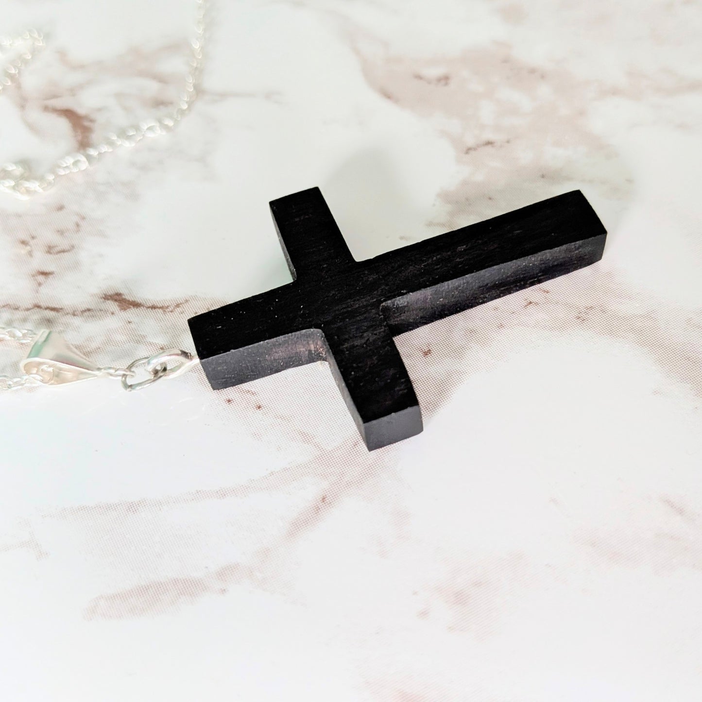 Hand carved African blackwood cross pendant