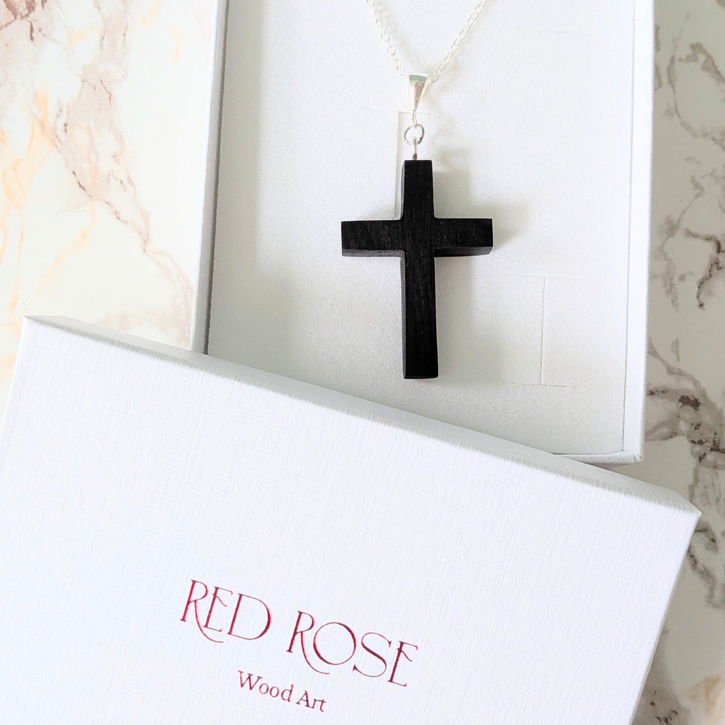 Hand carved African blackwood cross pendant
